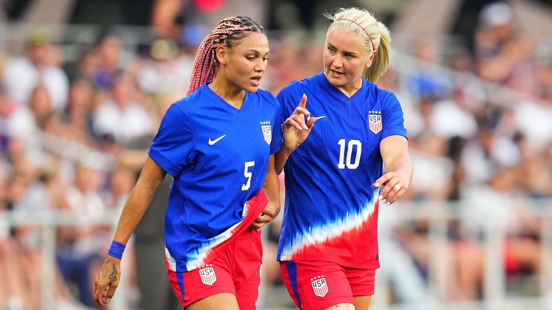 Trinity Rodman #5 of the United States talks to Lindsey Horan #10